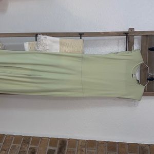 NWOT green jumpsuit, shoulder pads